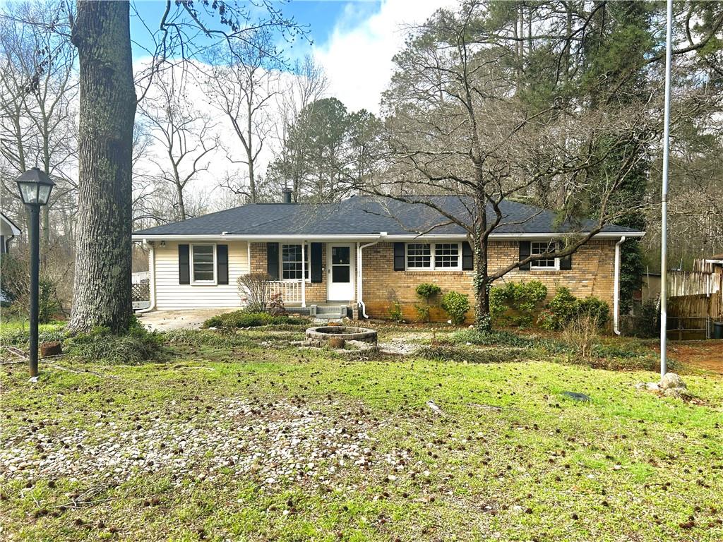 2115 Venesa Circle Austell, GA 30168 - Photo 1 of 28 front view of a house with a yard