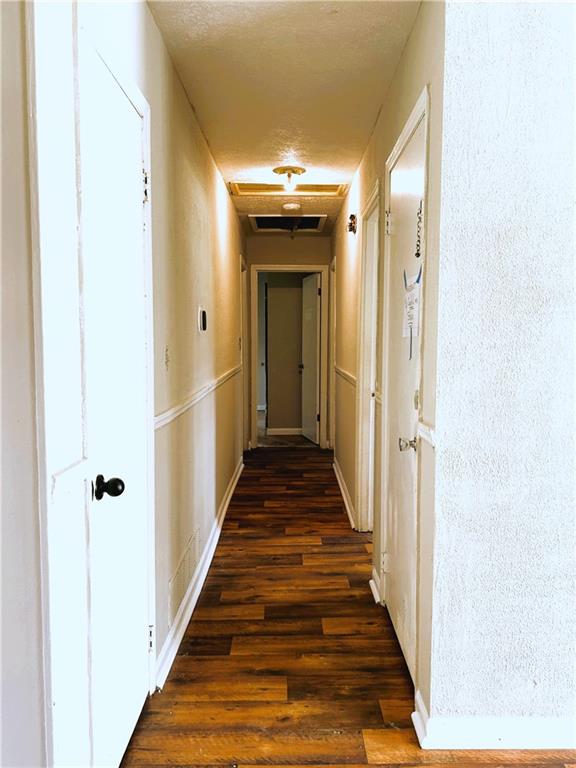 2115 Venesa Circle Austell, GA 30168 - Photo 13 of 28 a view of a hallway with wooden floor and staircase