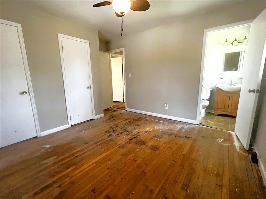 2115 Venesa Circle Austell, GA 30168 - Photo 15 of 28 a view of a livingroom with wooden floor and windows