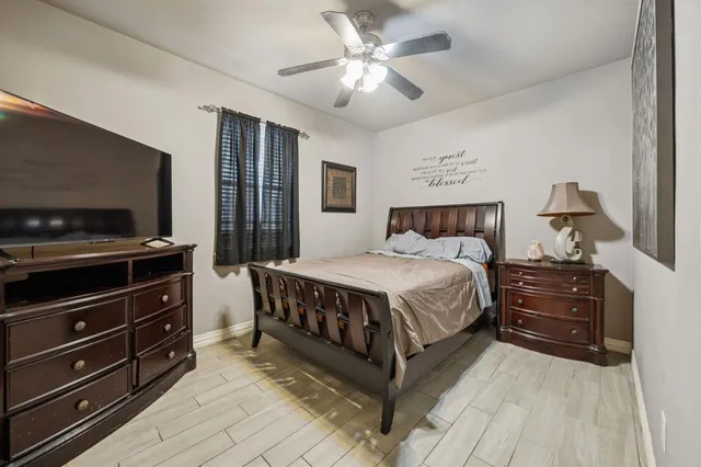 a view of a house with swimming pool and sitting area