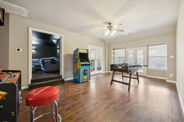 an aerial view of residential houses with outdoor space