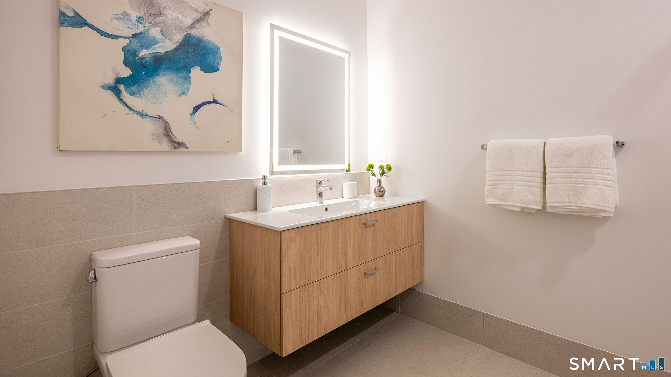 22 Hubbard Road Wilton, CT 06897 - Photo 11 of 19 a bathroom with a toilet sink and mirror