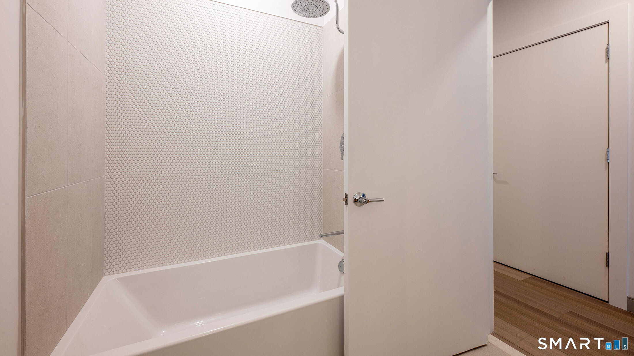 22 Hubbard Road Wilton, CT 06897 - Photo 16 of 19 a bathroom with a bathtub