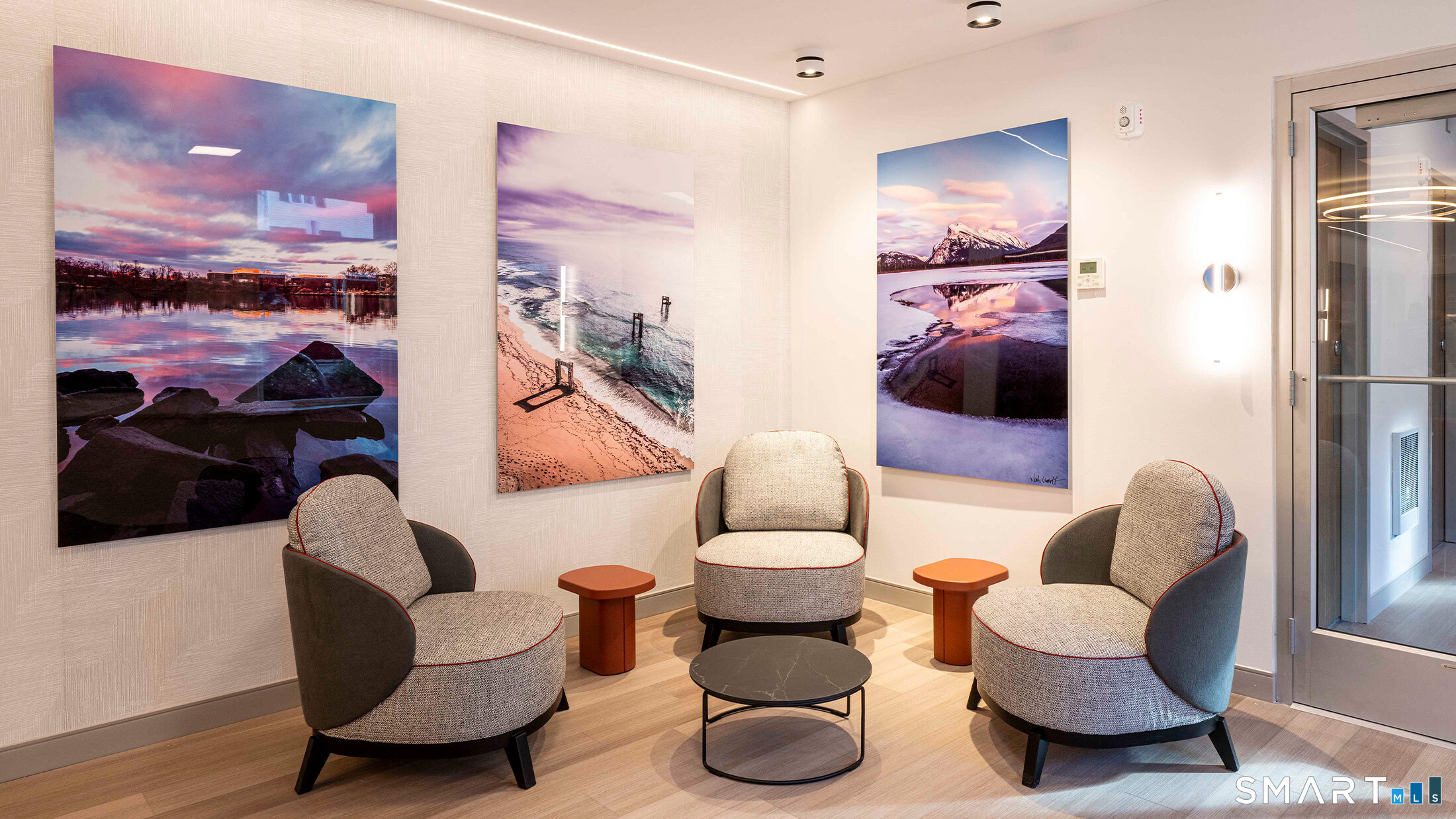 22 Hubbard Road Wilton, CT 06897 - Photo 6 of 19 a living room with furniture and a painting on the wall