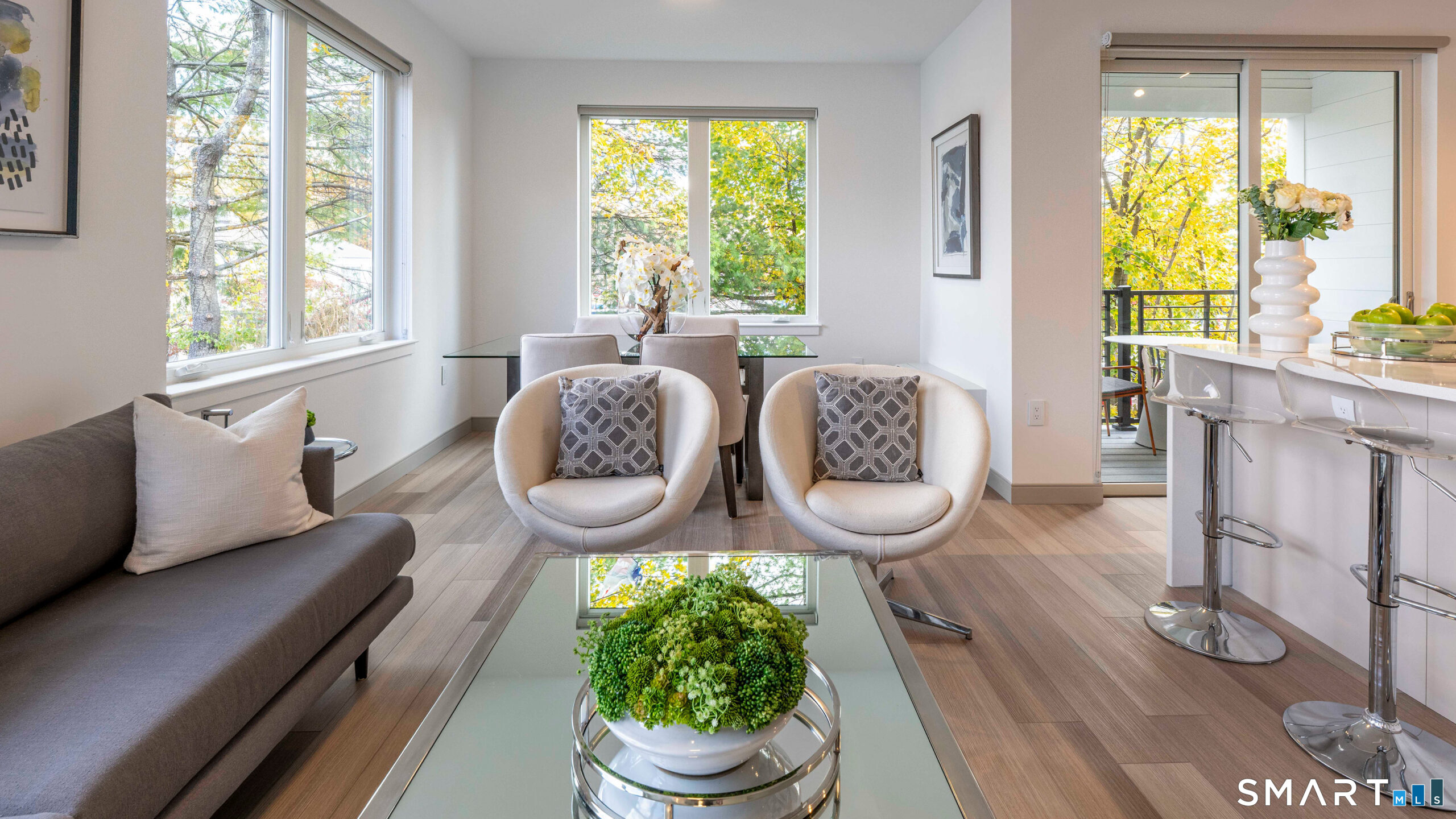 22 Hubbard Road Wilton, CT 06897 - Photo 8 of 19 a living room with furniture and a large window