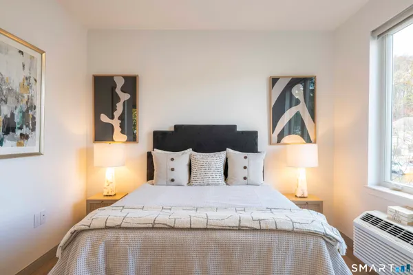 a kitchen that has a table and chairs in it