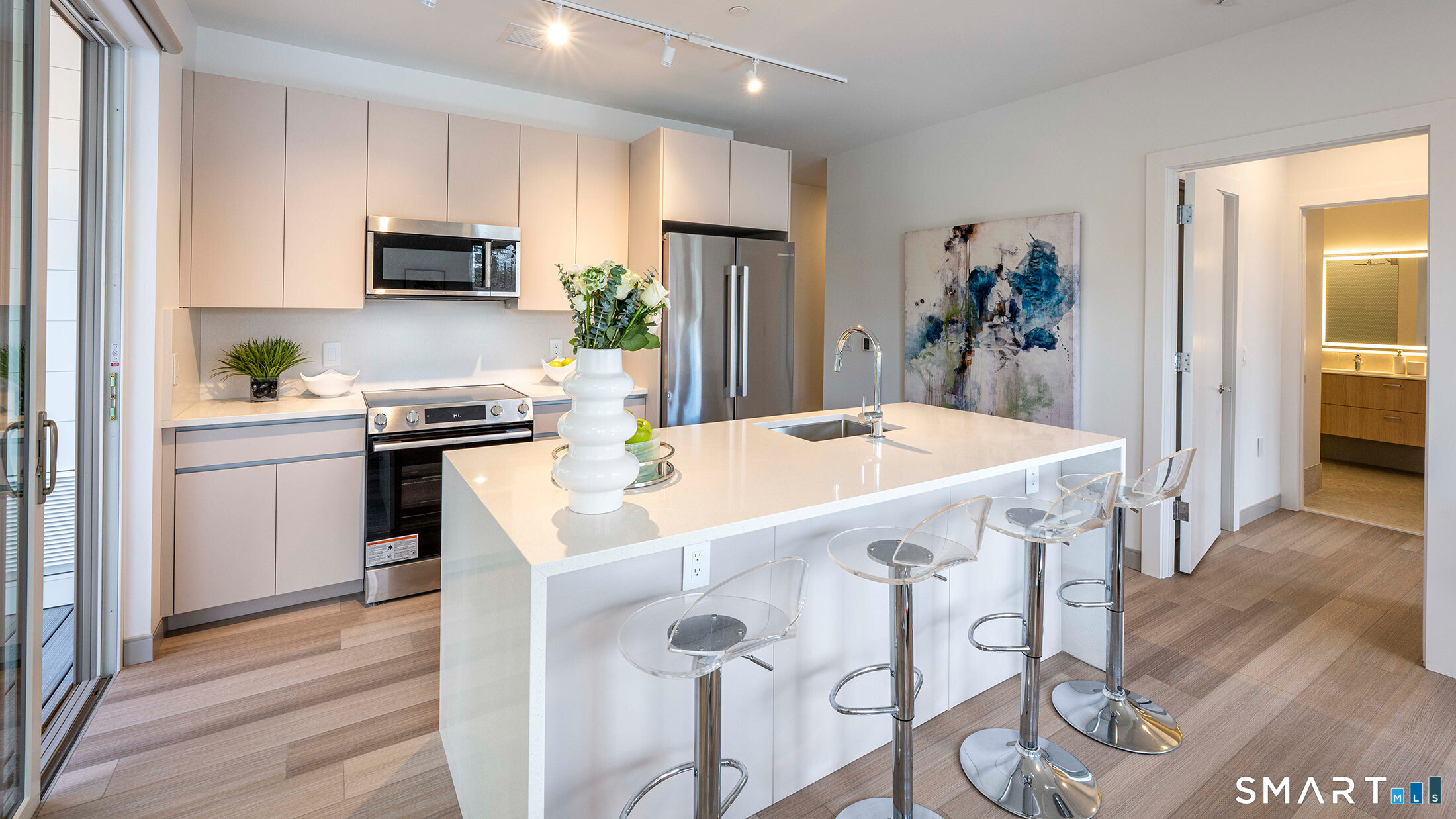 22 Hubbard Road Wilton, CT 06897 - Photo 10 of 19 a kitchen that has a table and chairs in it