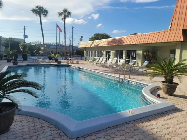 a front view of a house with swimming pool