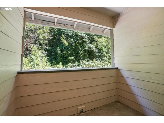 a view of a window in the balcony