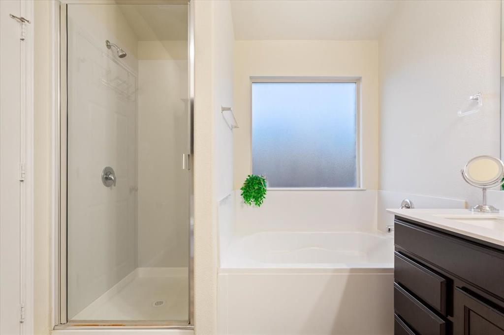 3105 Beutel Road Lorena, TX 76655 - Photo 17 of 26 a bathroom with a shower and a sink