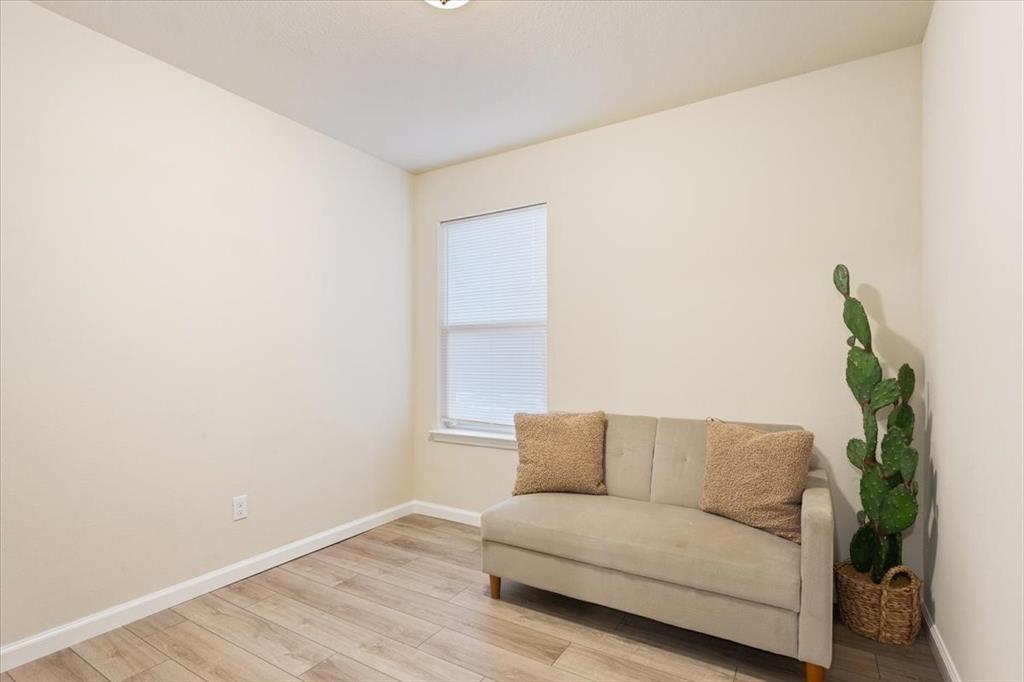 3105 Beutel Road Lorena, TX 76655 - Photo 21 of 26 a living room with a couch