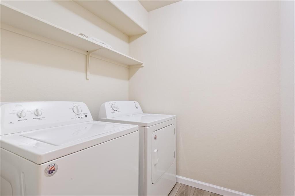 3105 Beutel Road Lorena, TX 76655 - Photo 22 of 26 a utility room with dryer and washer