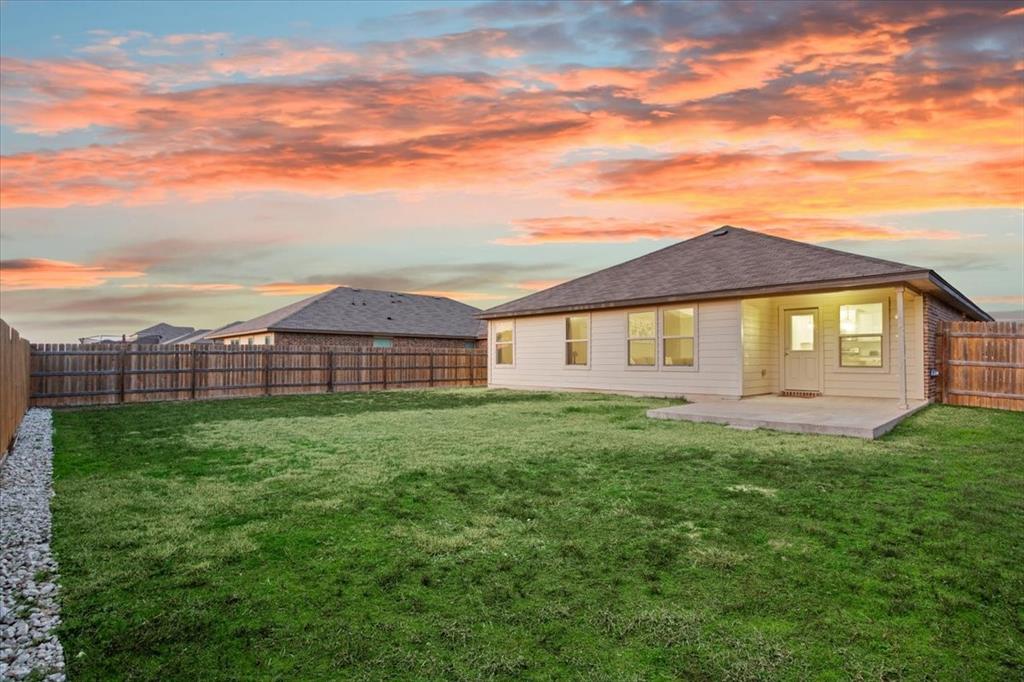 3105 Beutel Road Lorena, TX 76655 - Photo 24 of 26 a view of a yard in front of a house with a large tree