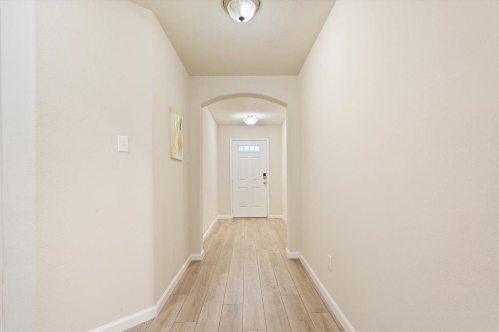 3105 Beutel Road Lorena, TX 76655 - Photo 3 of 26 a view of a hallway with wooden floor