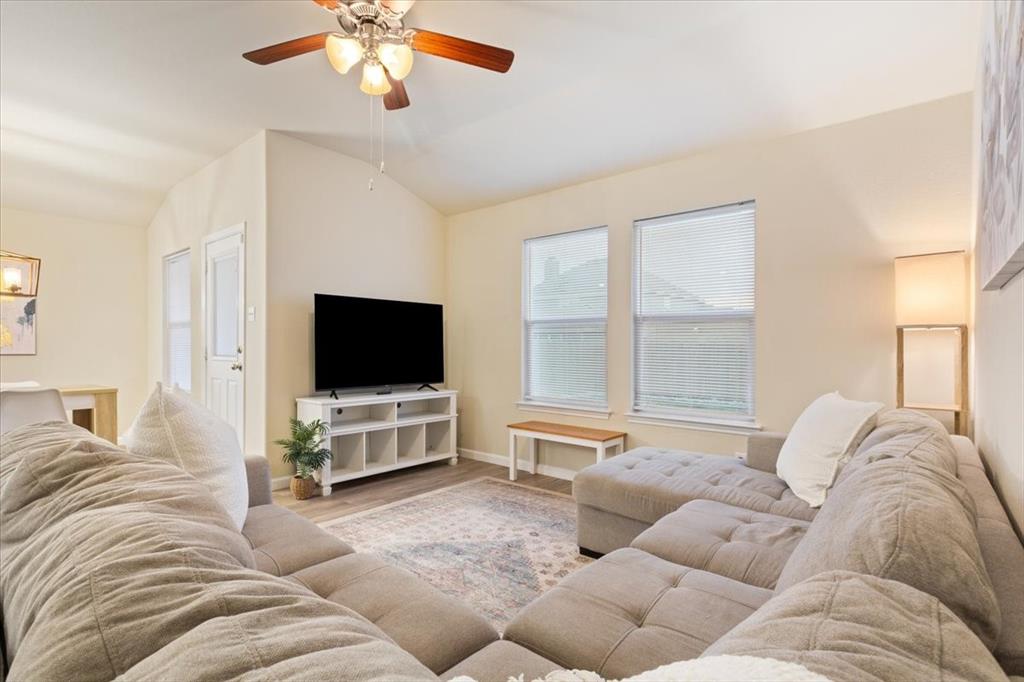 3105 Beutel Road Lorena, TX 76655 - Photo 6 of 26 a living room with furniture and a flat screen tv