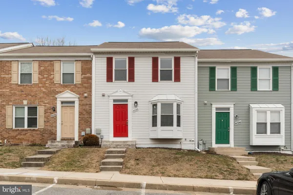 a front view of a house with windows