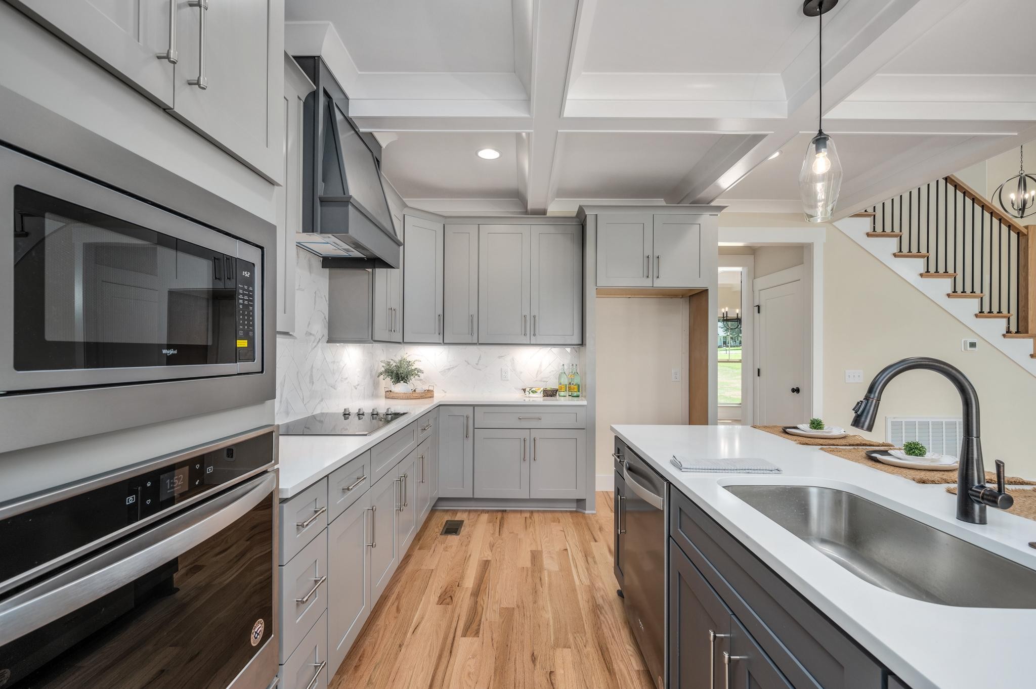 2416 Dilton Mankin Road Murfreesboro, TN 37127 - Photo 12 of 36 a kitchen with a sink stainless steel appliances and cabinets