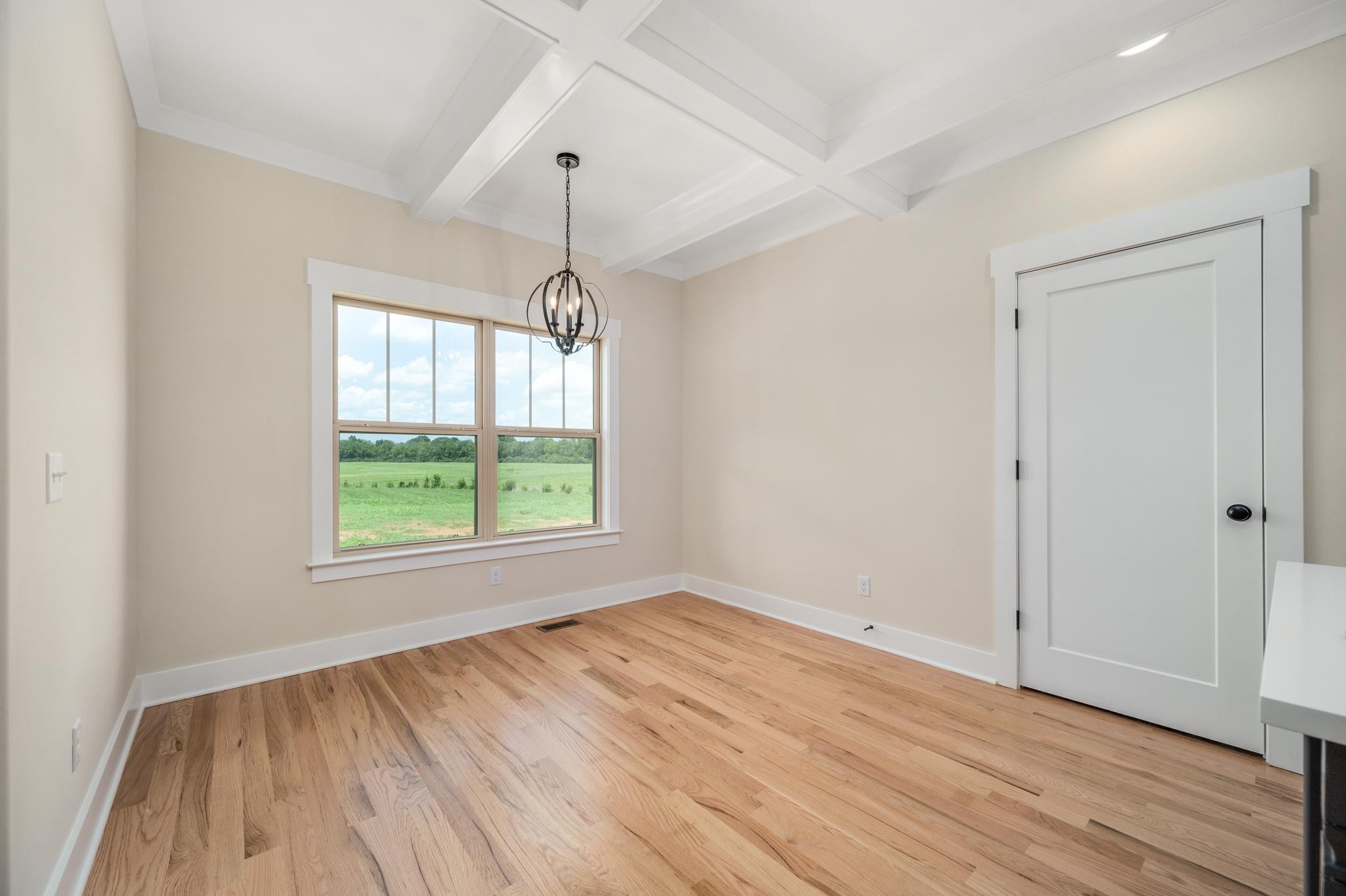 2416 Dilton Mankin Road Murfreesboro, TN 37127 - Photo 14 of 36 wooden floor in an empty room with a window