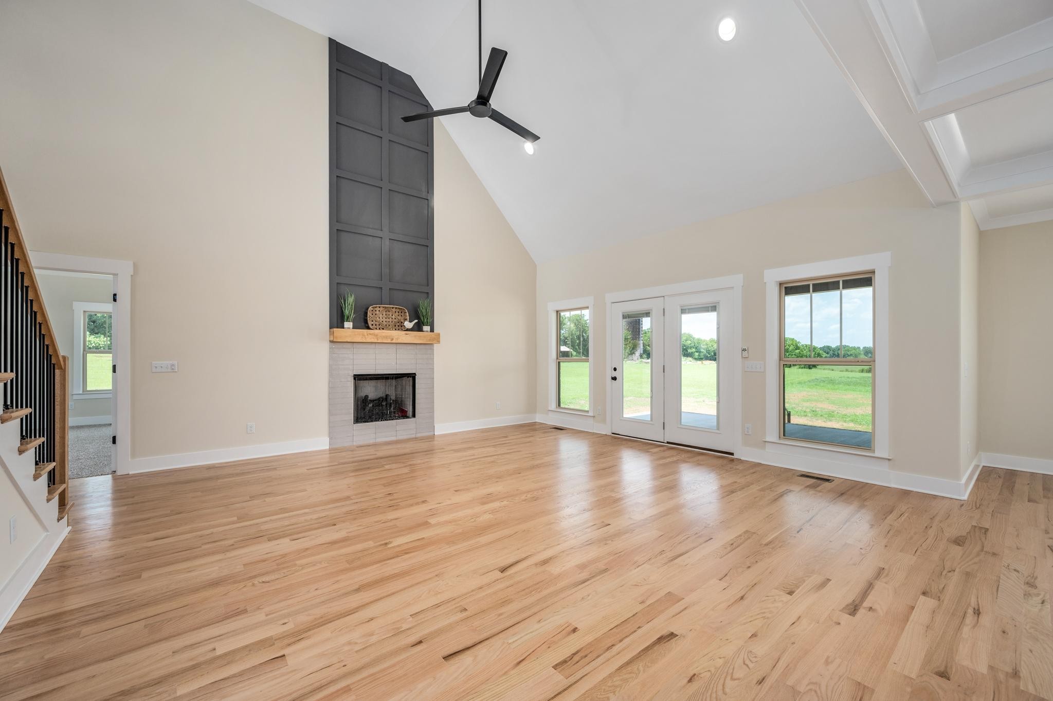 2416 Dilton Mankin Road Murfreesboro, TN 37127 - Photo 15 of 36 a view of an empty room with a window and wooden floor