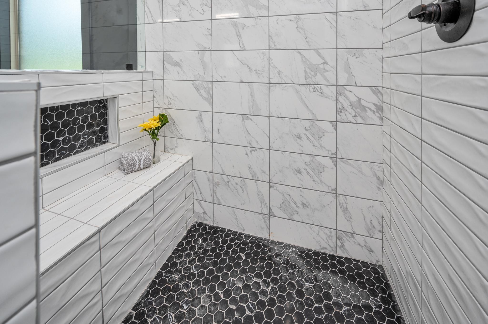 2416 Dilton Mankin Road Murfreesboro, TN 37127 - Photo 19 of 36 a bathroom with a sink and a shower