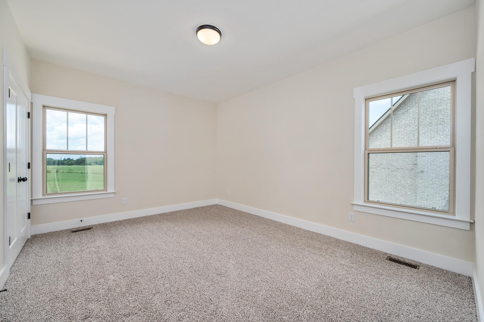 2416 Dilton Mankin Road Murfreesboro, TN 37127 - Photo 24 of 36 an empty room with windows