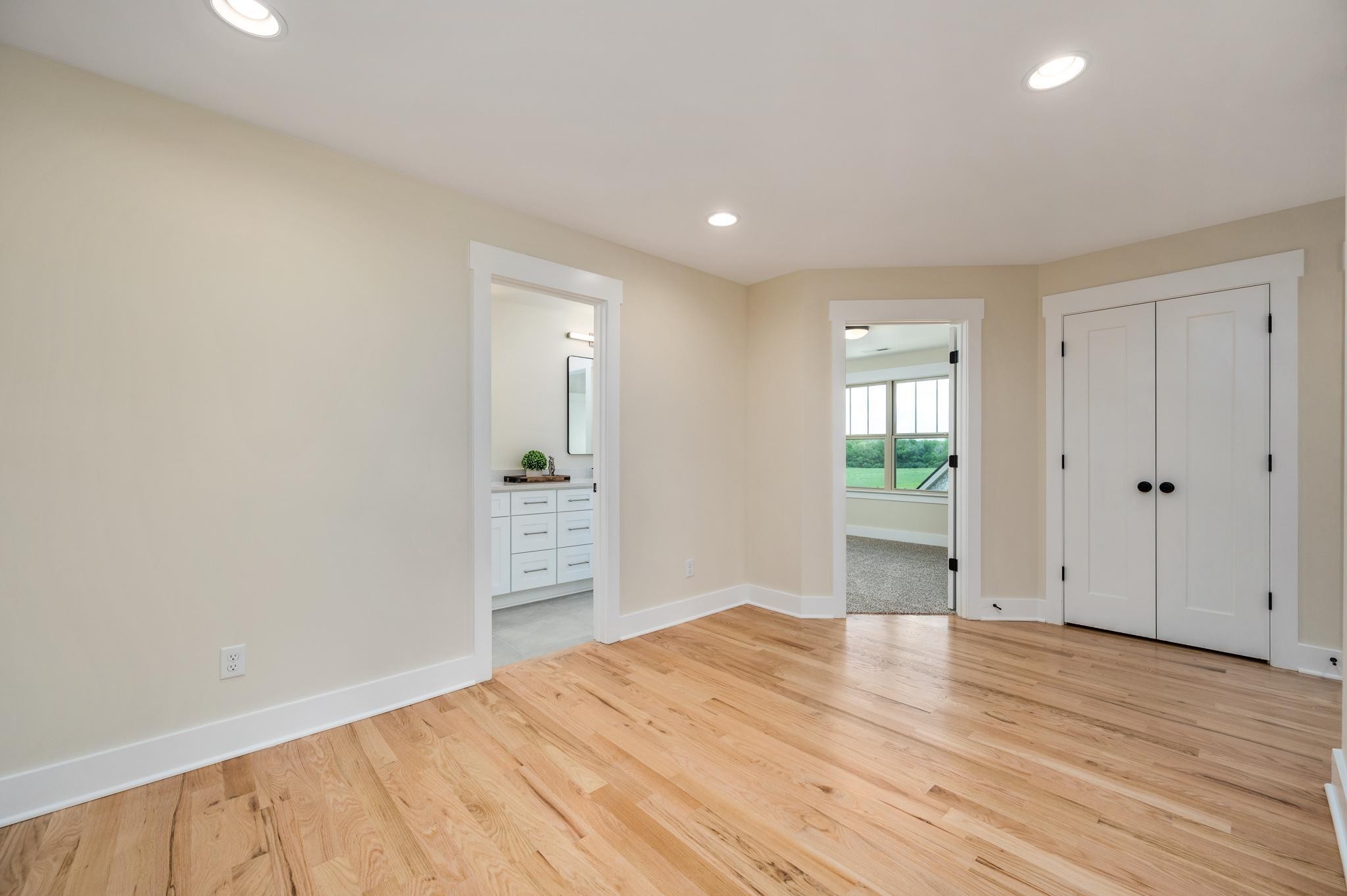 2416 Dilton Mankin Road Murfreesboro, TN 37127 - Photo 26 of 36 a view of a room with wooden floor and bathroom