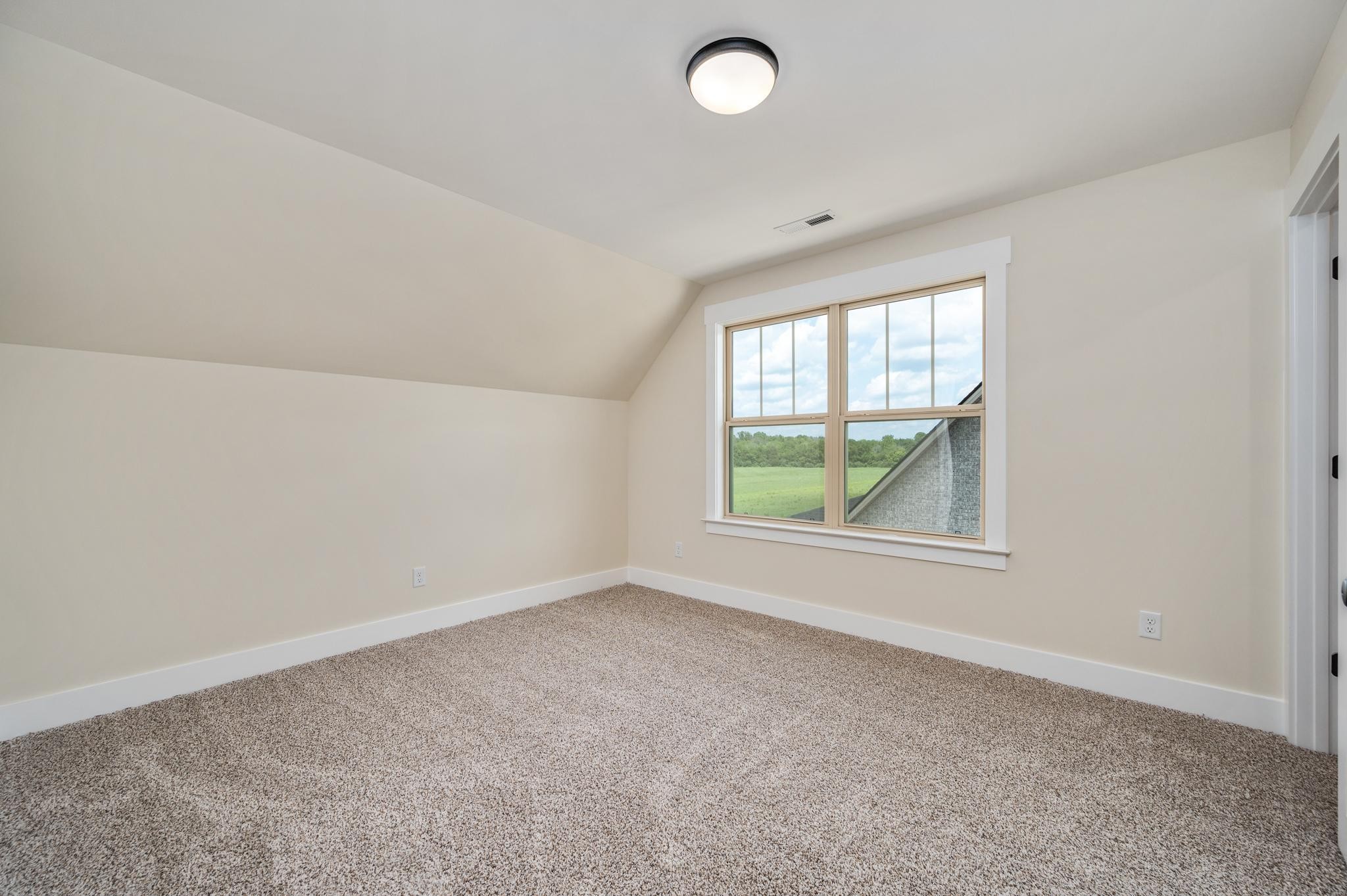 2416 Dilton Mankin Road Murfreesboro, TN 37127 - Photo 29 of 36 an empty room with windows