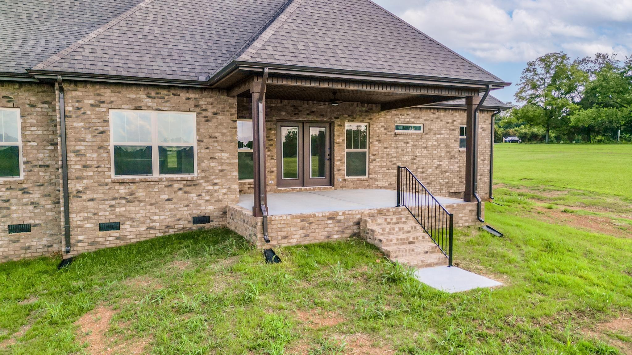 2416 Dilton Mankin Road Murfreesboro, TN 37127 - Photo 33 of 36 front view of a house with a yard