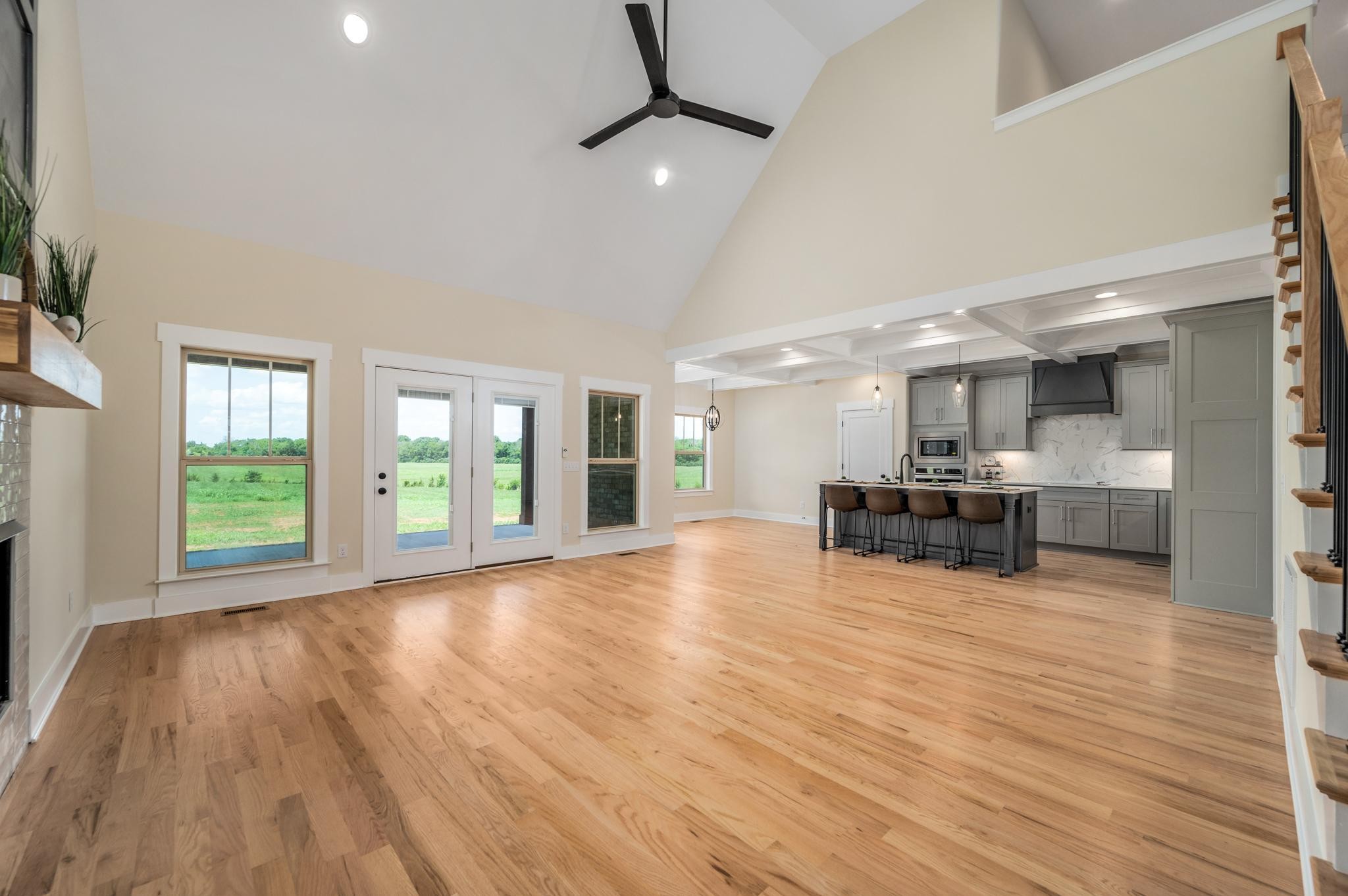 2416 Dilton Mankin Road Murfreesboro, TN 37127 - Photo 8 of 36 a view of a kitchen with a sink and wooden floor