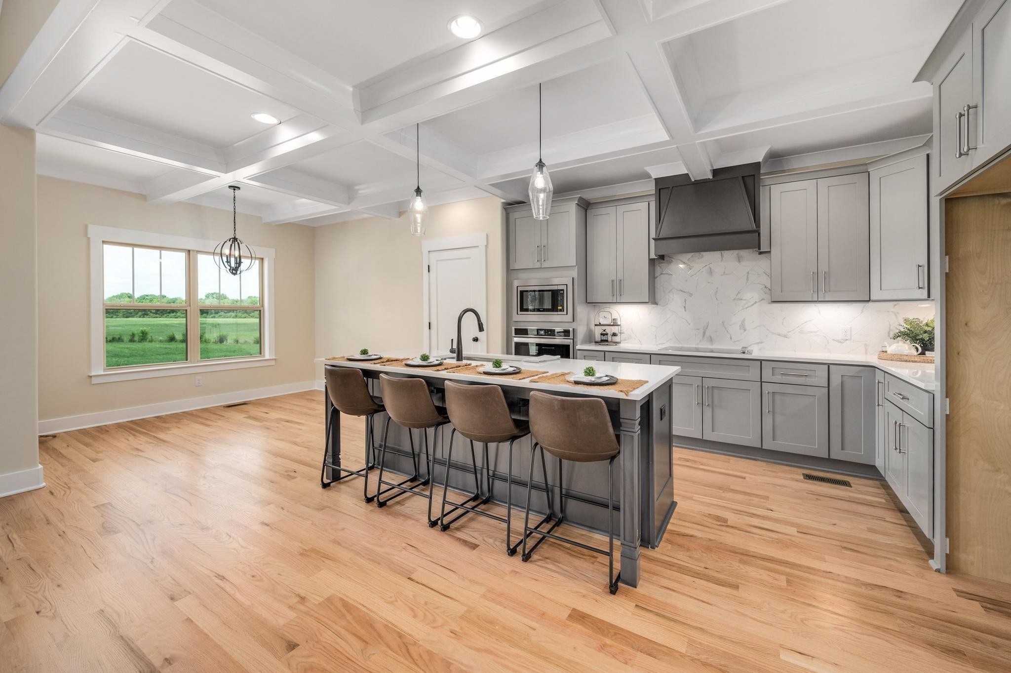 2416 Dilton Mankin Road Murfreesboro, TN 37127 - Photo 10 of 36 a kitchen with a sink cabinets and wooden floor