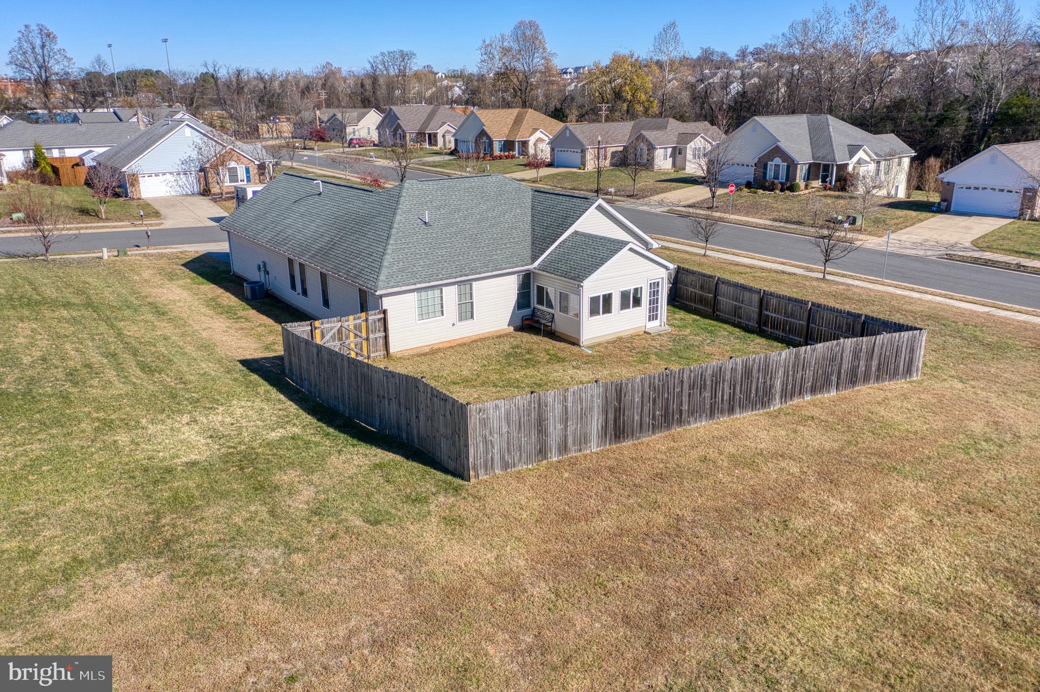 421 Queen Street Culpeper, VA 22701 - Photo 11 of 52 a view of a house with outdoor space and sitting area