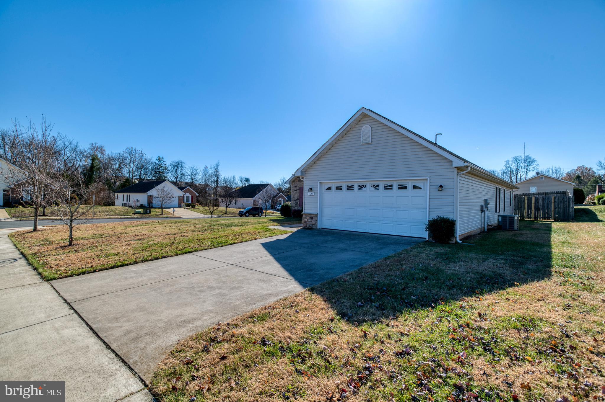 421 Queen Street Culpeper, VA 22701 - Photo 19 of 52 a front view of a house with a yard