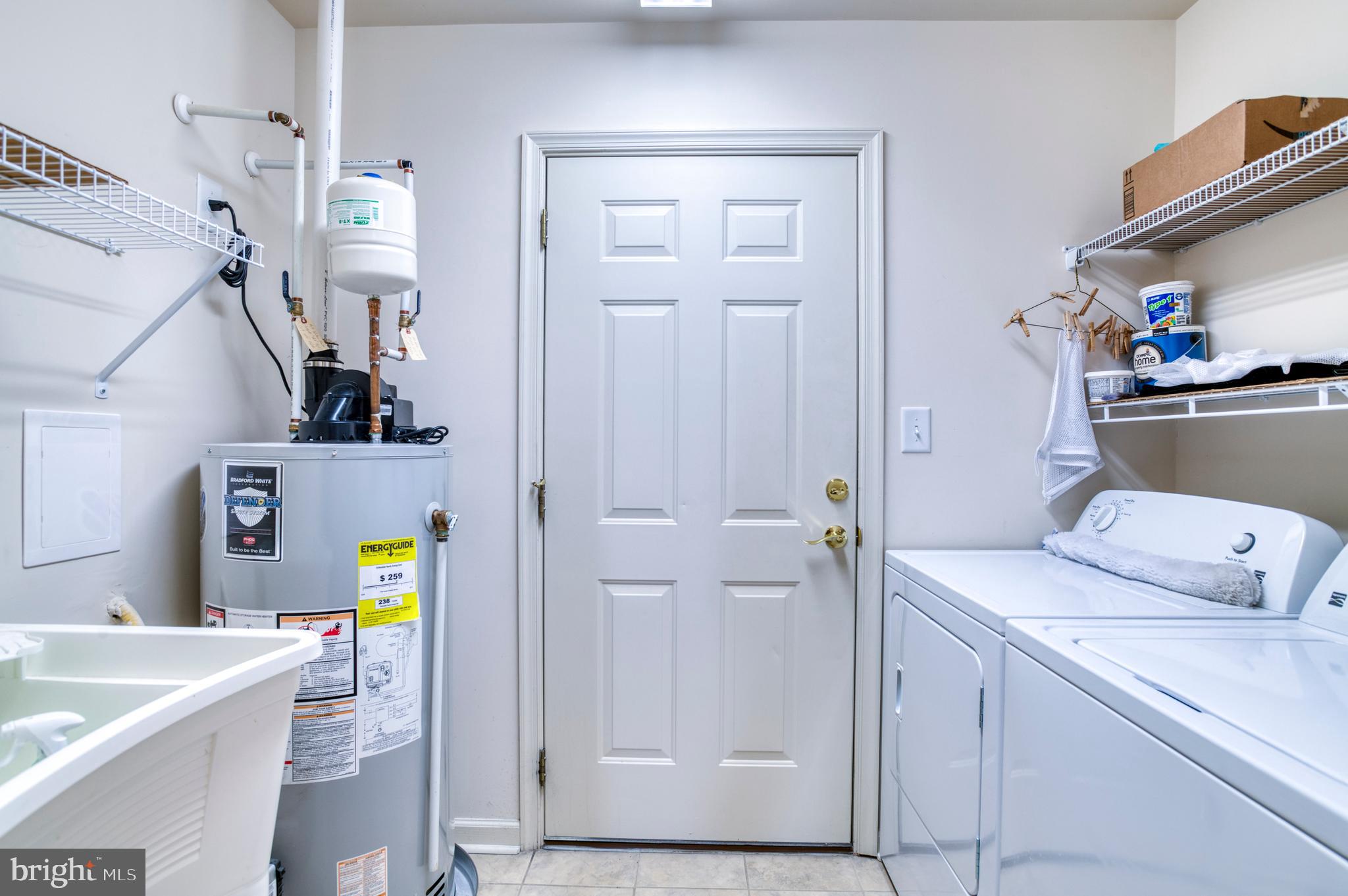 421 Queen Street Culpeper, VA 22701 - Photo 41 of 52 a utility room with dryer and washer
