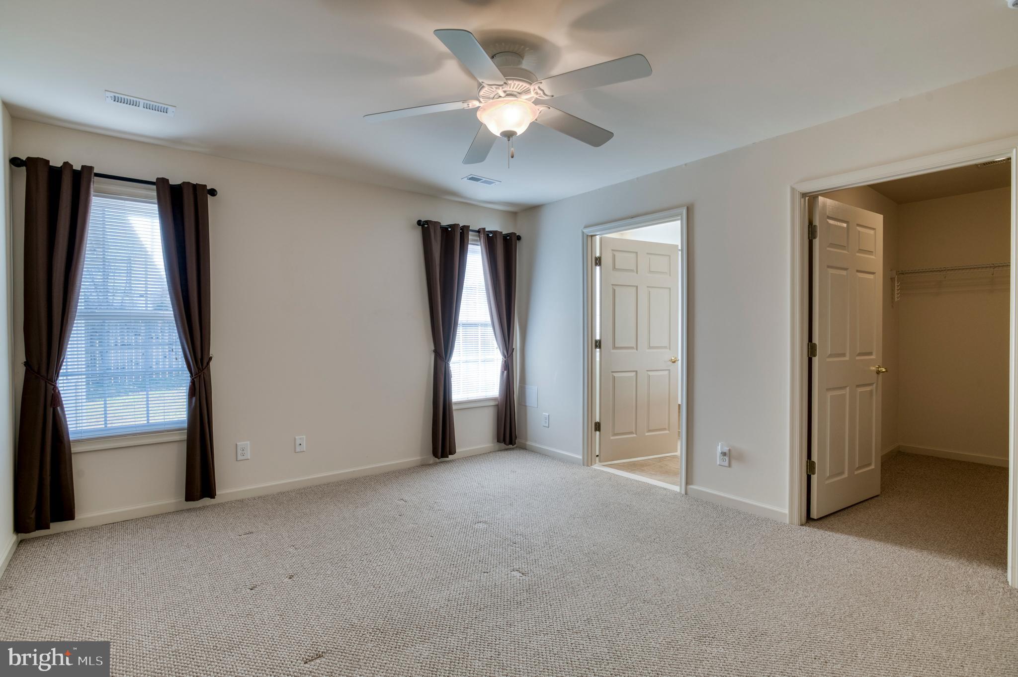 421 Queen Street Culpeper, VA 22701 - Photo 43 of 52 a view of a livingroom with a ceiling fan window and hardwood