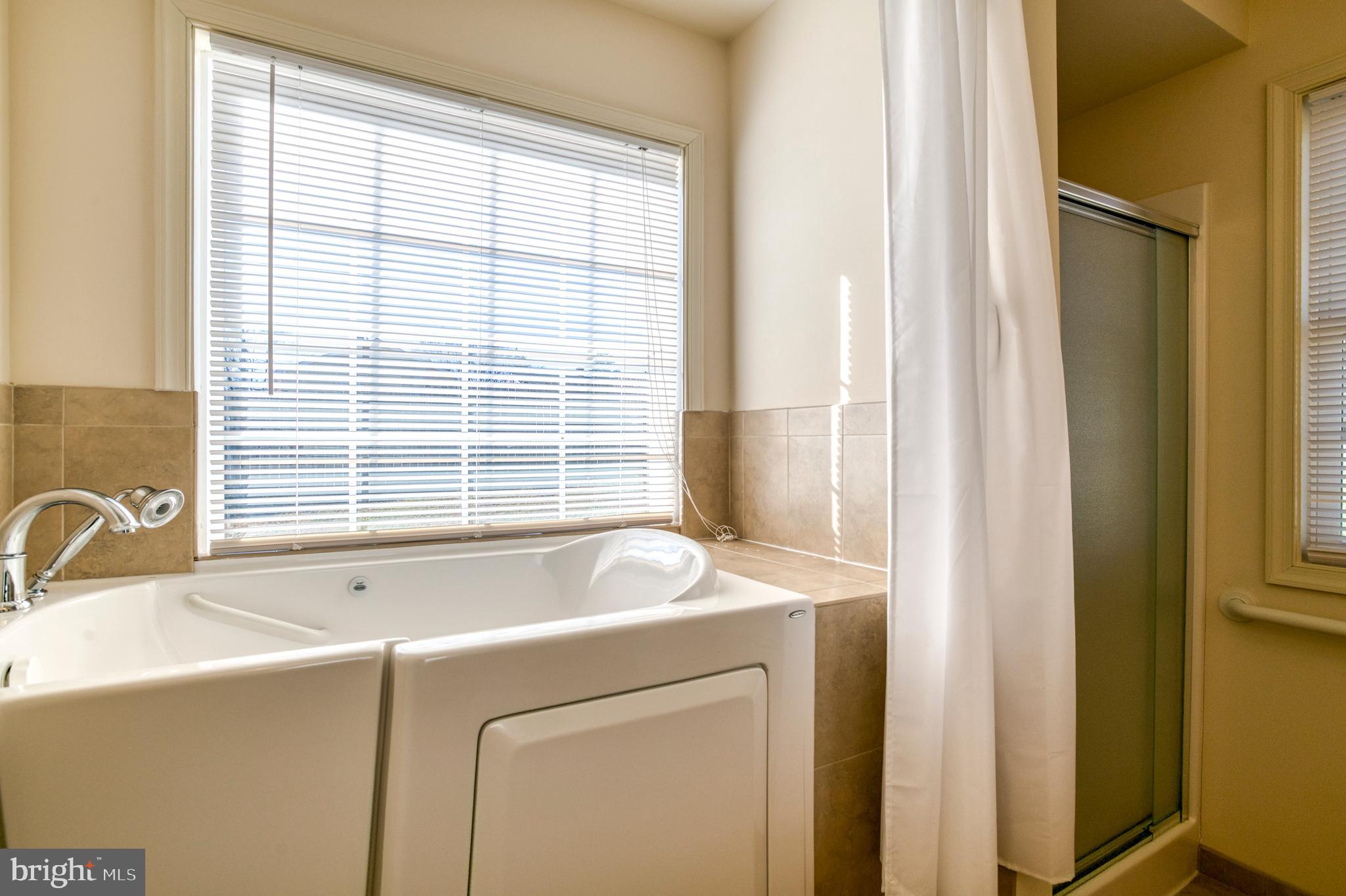 421 Queen Street Culpeper, VA 22701 - Photo 49 of 52 a bath tub sitting next to a window
