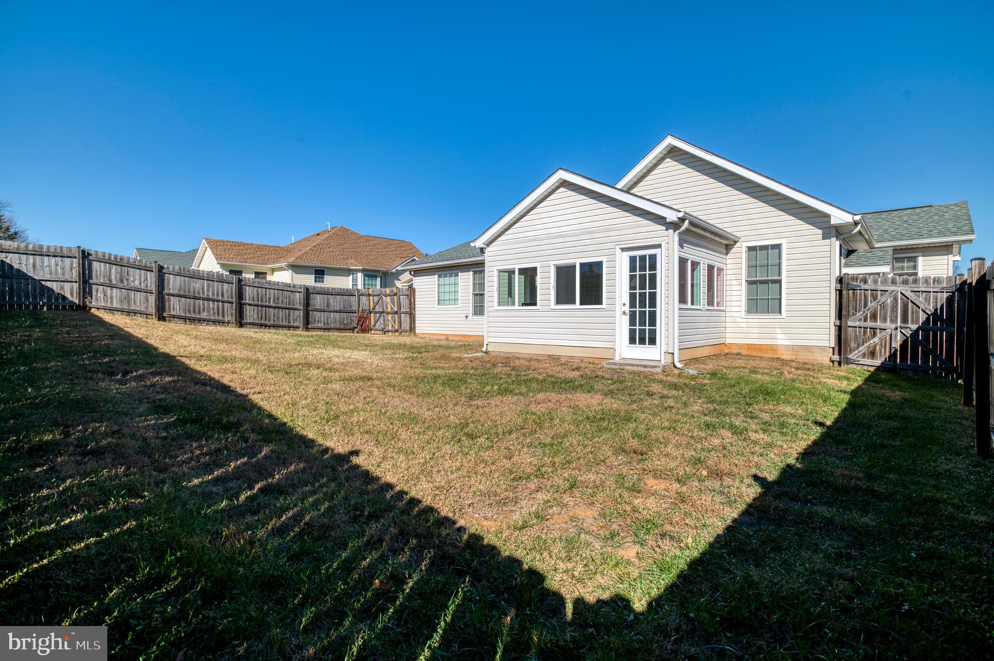 421 Queen Street Culpeper, VA 22701 - Photo 52 of 52 a front view of a house with a yard