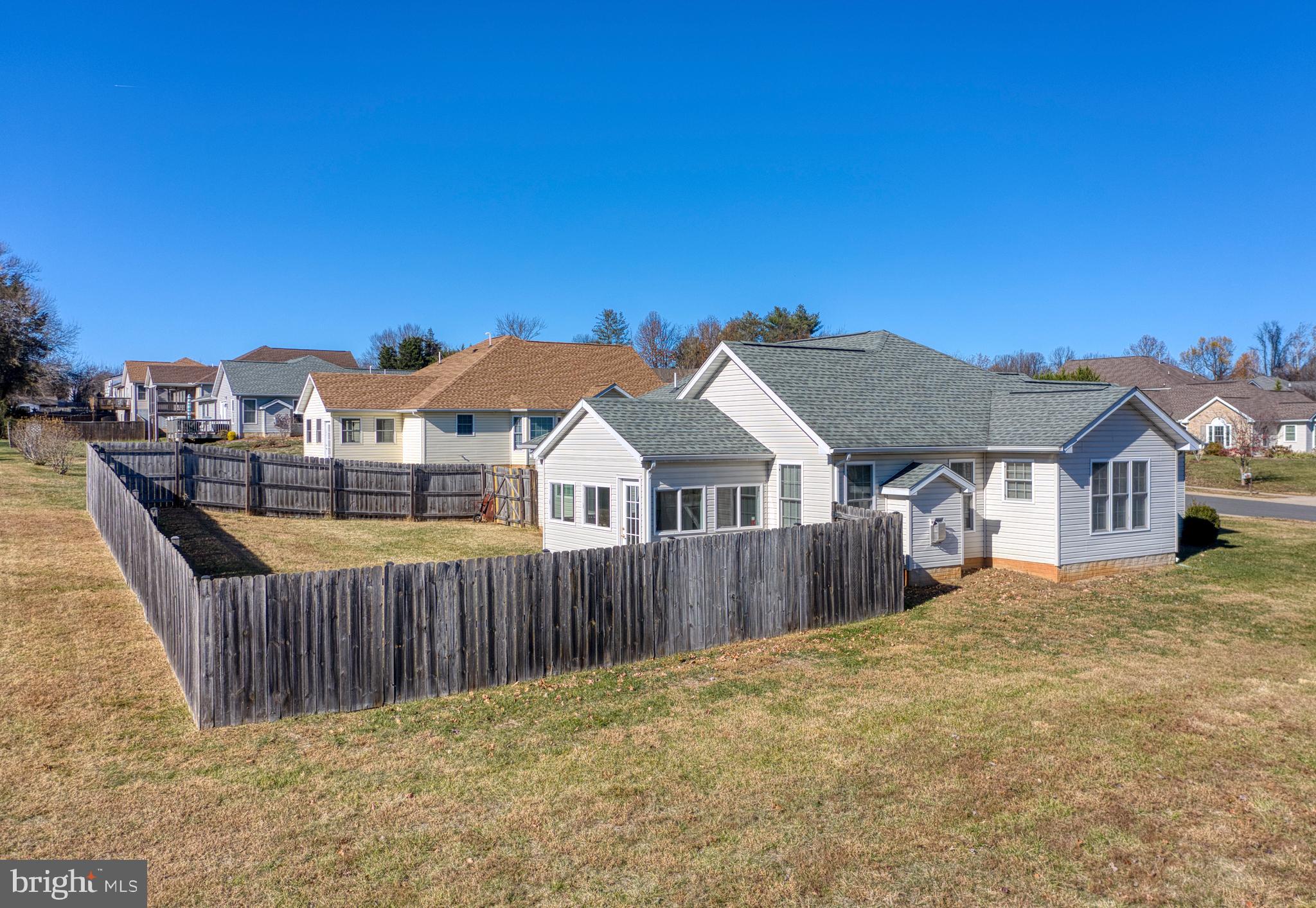 421 Queen Street Culpeper, VA 22701 - Photo 9 of 52 a view of a house with wooden fence