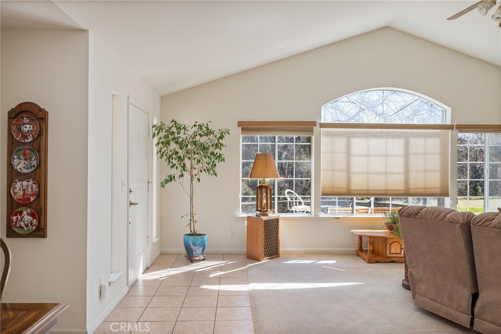 50174 Bissett Station Road Oakhurst, CA 93644 - Photo 20 of 75 a living room with furniture and a window