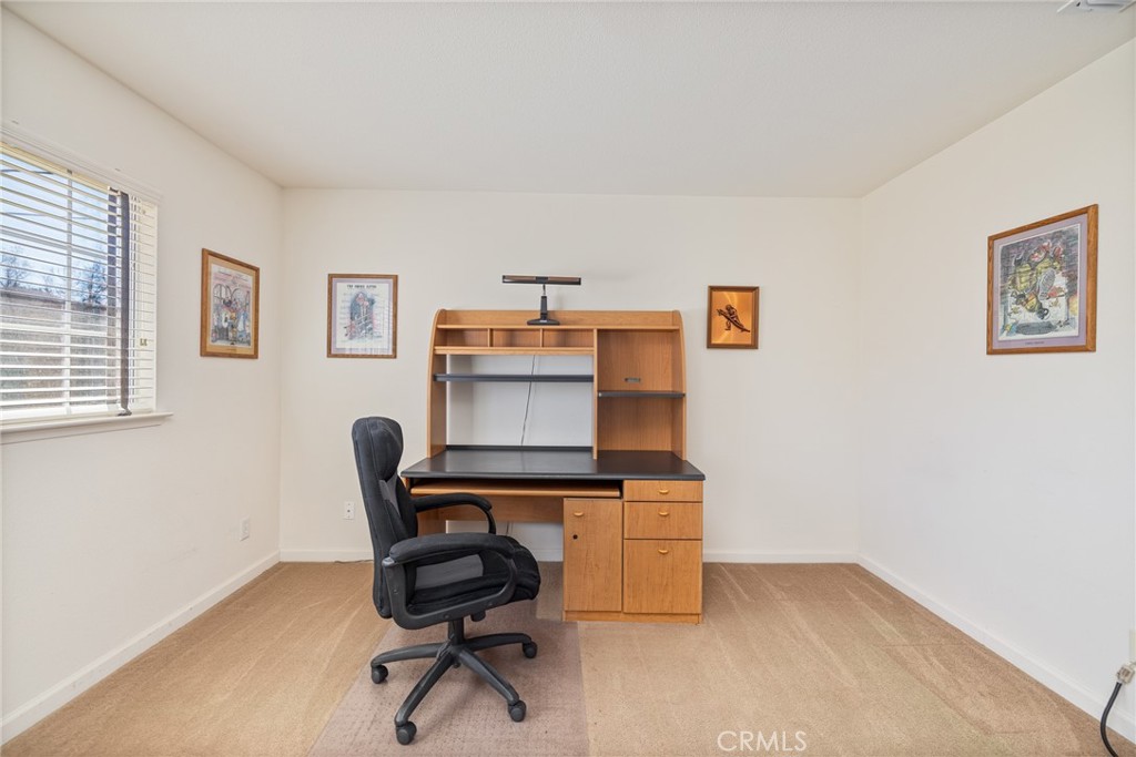 50174 Bissett Station Road Oakhurst, CA 93644 - Photo 25 of 75 a view of a workspace with furniture and a window