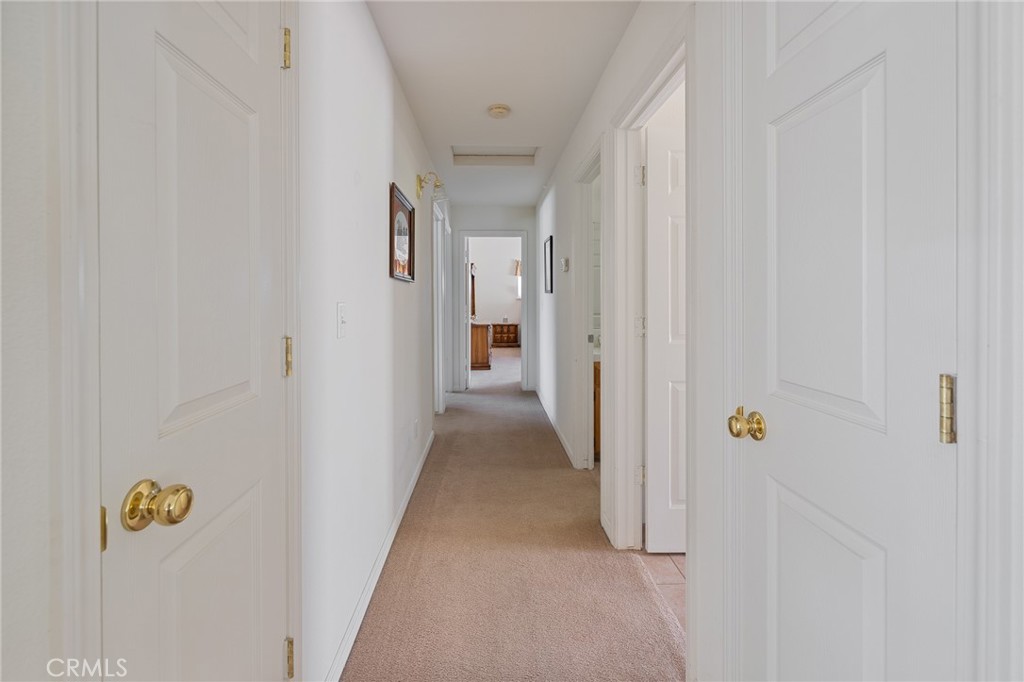 50174 Bissett Station Road Oakhurst, CA 93644 - Photo 35 of 75 a view of a hallway with wooden floor