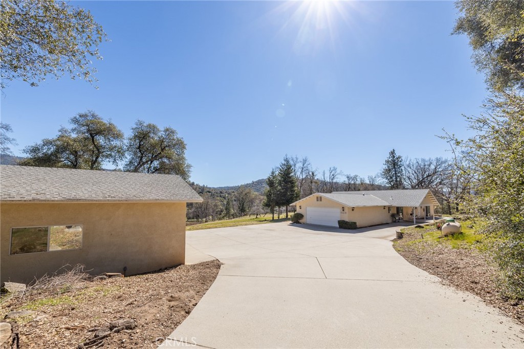 50174 Bissett Station Road Oakhurst, CA 93644 - Photo 41 of 75 a view of terrace with trees
