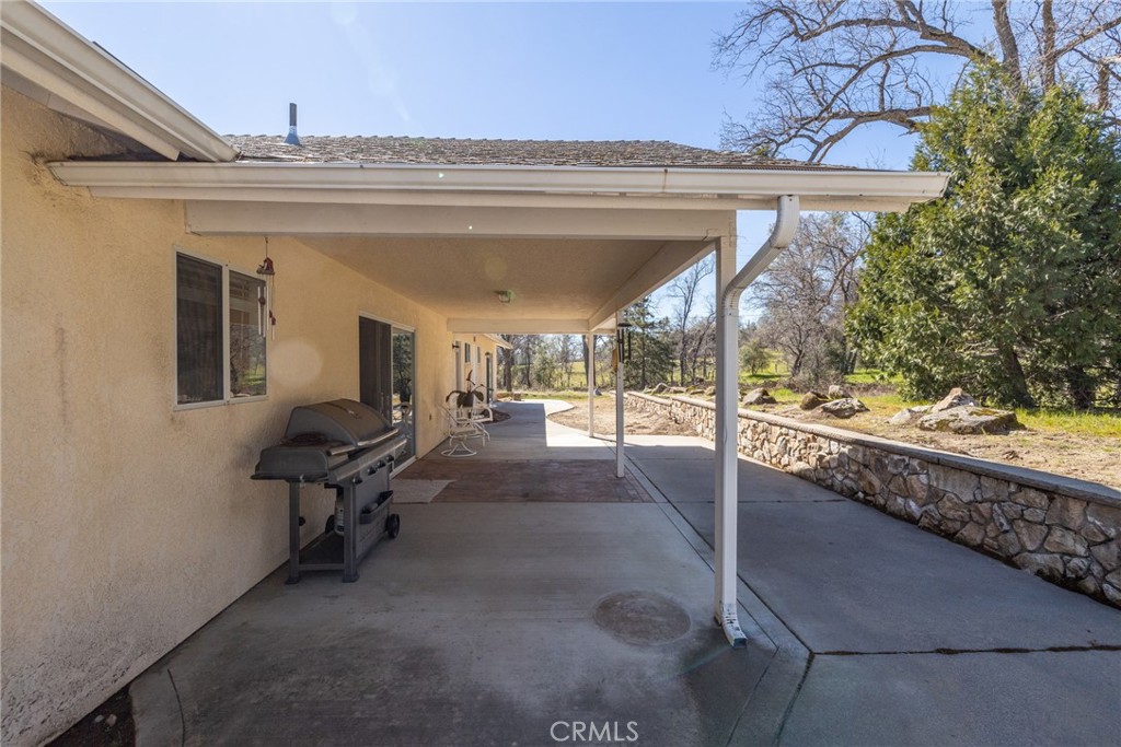 50174 Bissett Station Road Oakhurst, CA 93644 - Photo 50 of 75 a view of entryway and hall with wooden floor