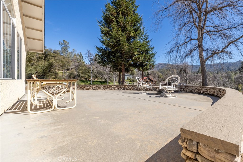 50174 Bissett Station Road Oakhurst, CA 93644 - Photo 57 of 75 a view of a bench with a sink