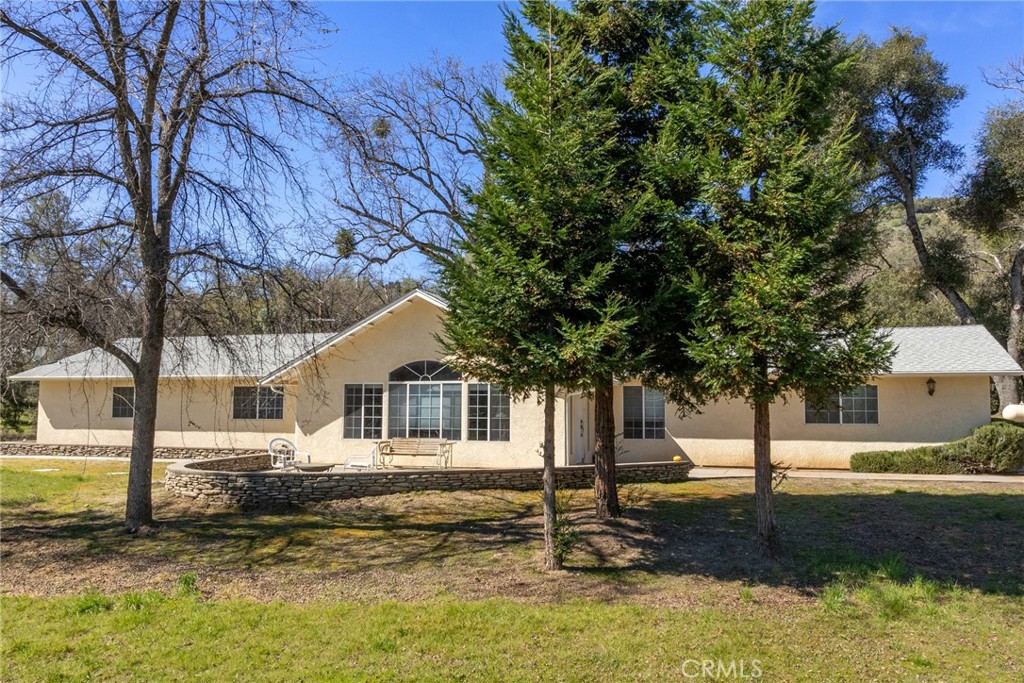 50174 Bissett Station Road Oakhurst, CA 93644 - Photo 74 of 75 a view of a house with a yard