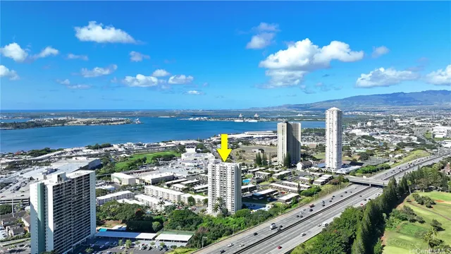 a view of a city with an ocean