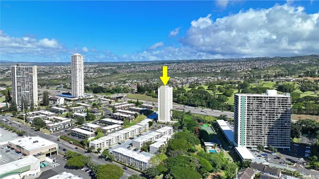 a view of a garden with a bench in a yard