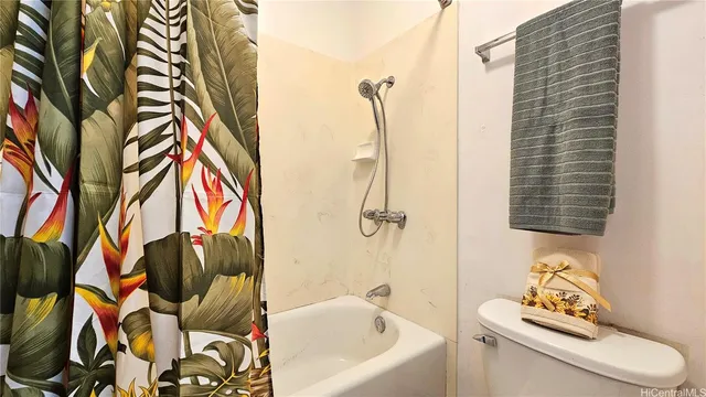 a bathroom with a sink toilet and bathtub