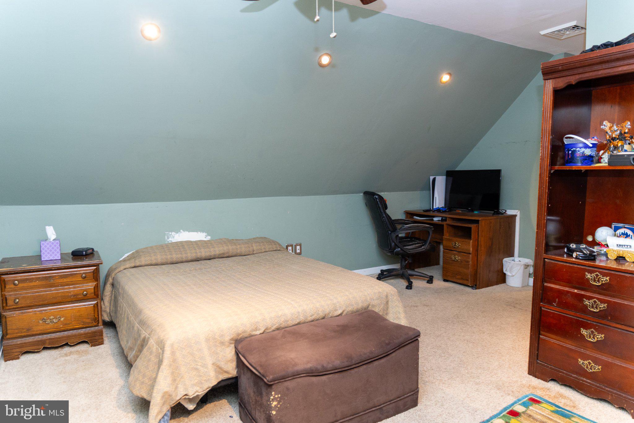 26 Plumtree Road Levittown, PA 19056 - Photo 12 of 16 Cozy attic retreat with workspace.