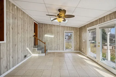 a view of entryway with a chandelier