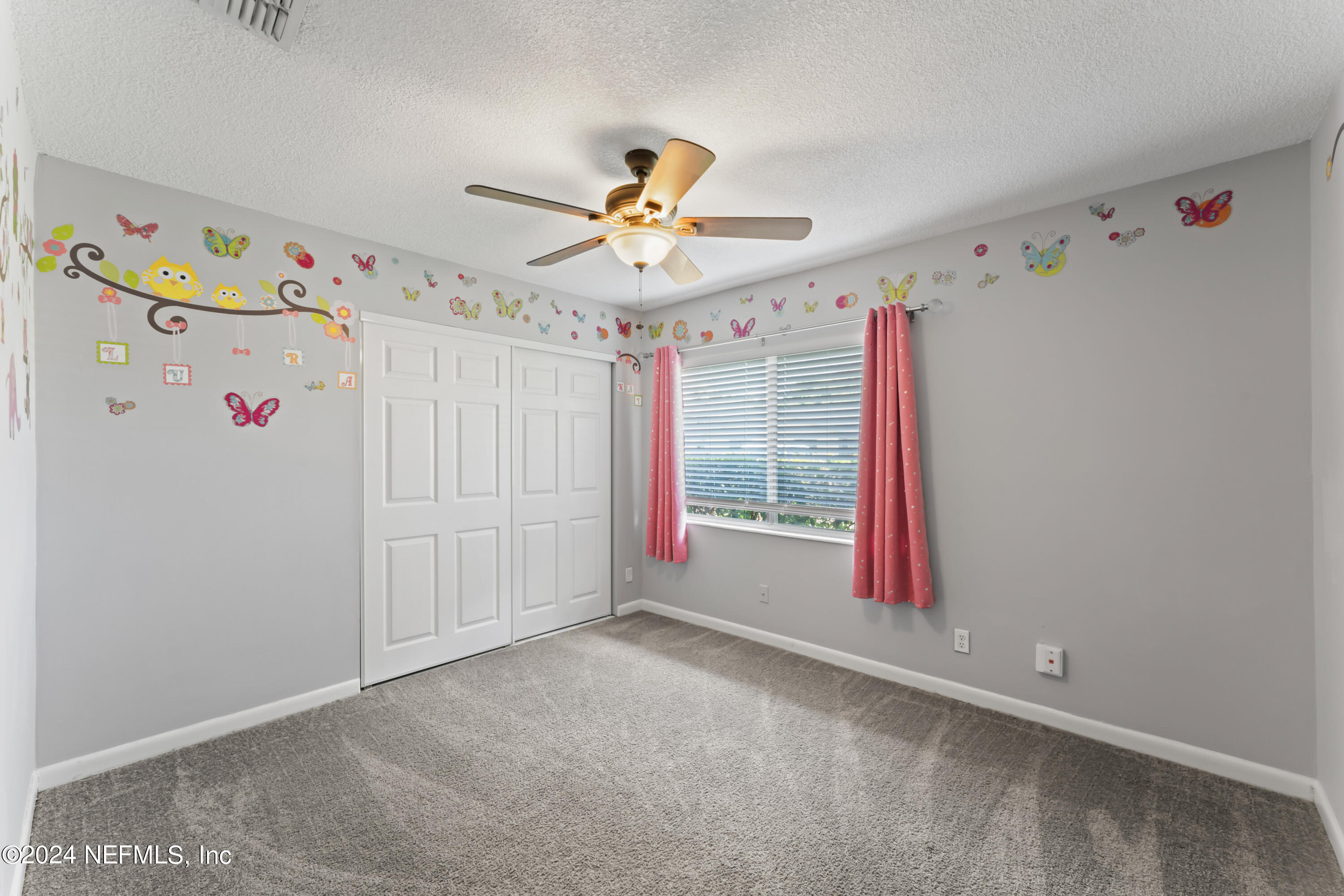 1283 The Grove Road Orange Park, FL 32073 - Photo 27 of 49 a view of an empty room with a window
